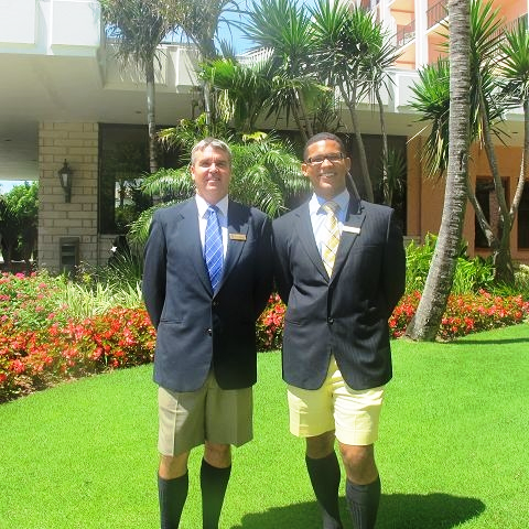 Bermudian hoteliers in their Bermuda shorts business attire